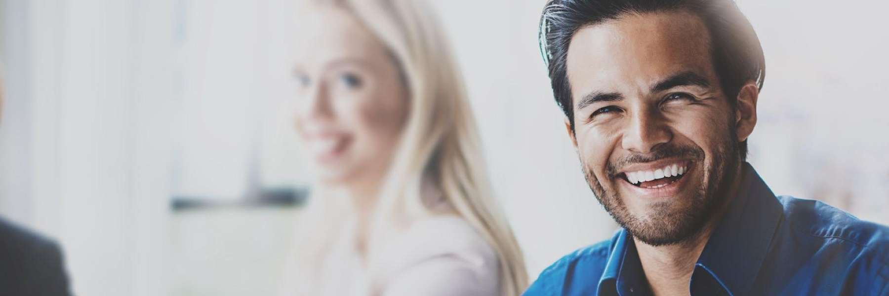 A bearded man grinning and flashing his white teeth in Northborough